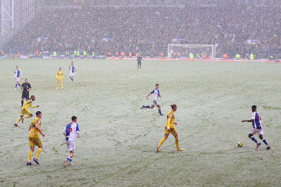 Blackburn Rovers' Clinton Mola attacks the Preston North End box in the snow during the Sky Bet Championship match at Ewood Park, Blackburn. Picture date: Saturday December 10, 2022.
