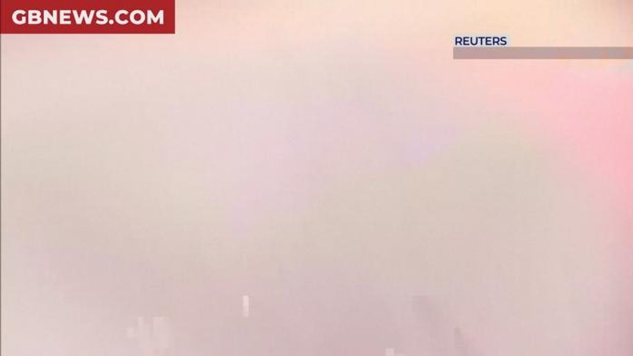 Flights grounded at British tourist hotspot as wildfires surround major airport