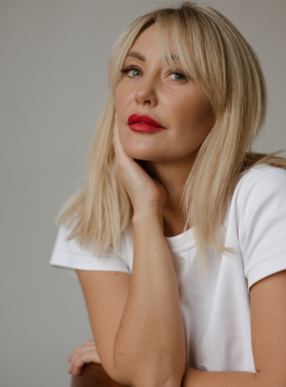 Blonde woman looking at camera