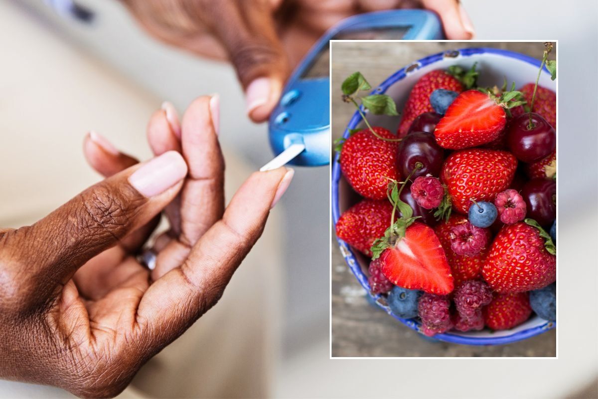 BLOOD GLUCOSE MONITOR AND BOWL OF BERRIES