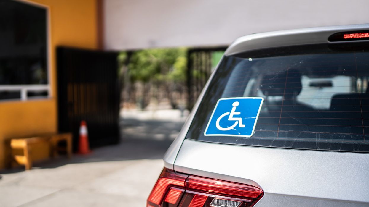 Blue disabled sign in car