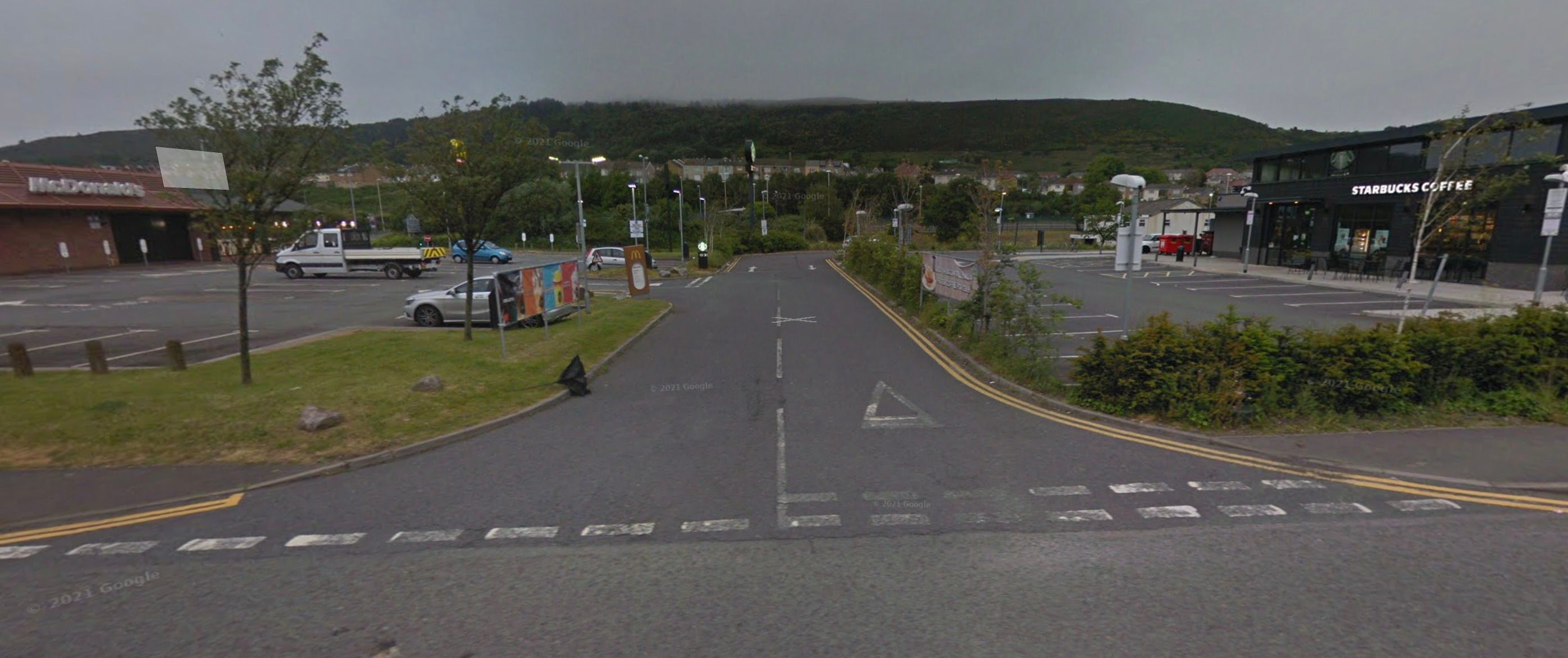 Bob Spink parked in the Starbucks car park (right) after visiting McDonalds