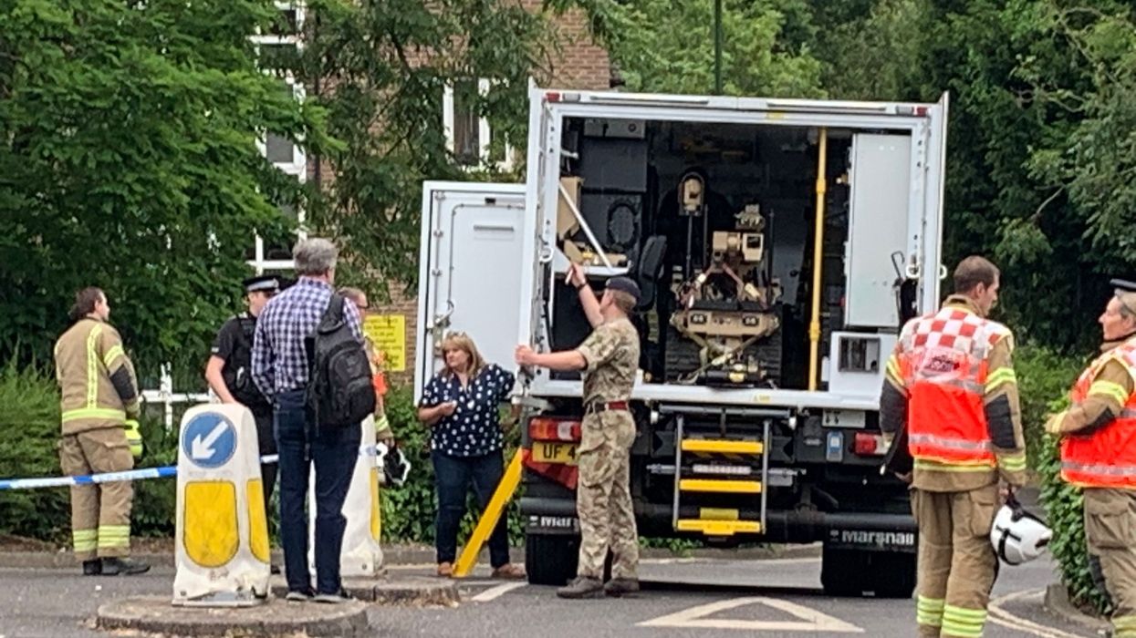 Bomb disposal team outside Jeremy Quin's office