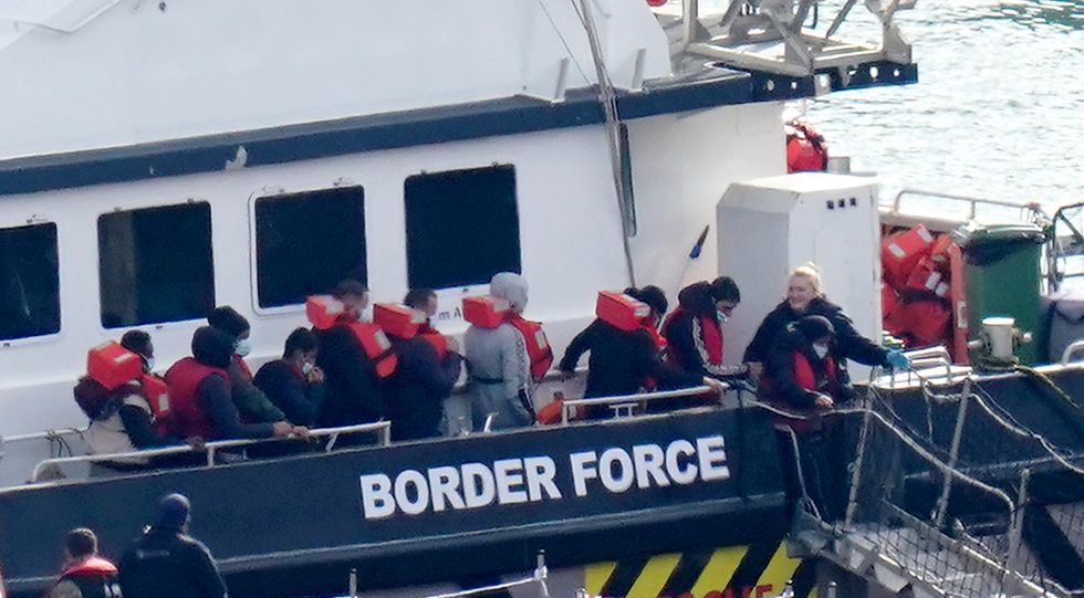 Border Force officials are escorting record numbers of migrants onto UK shores