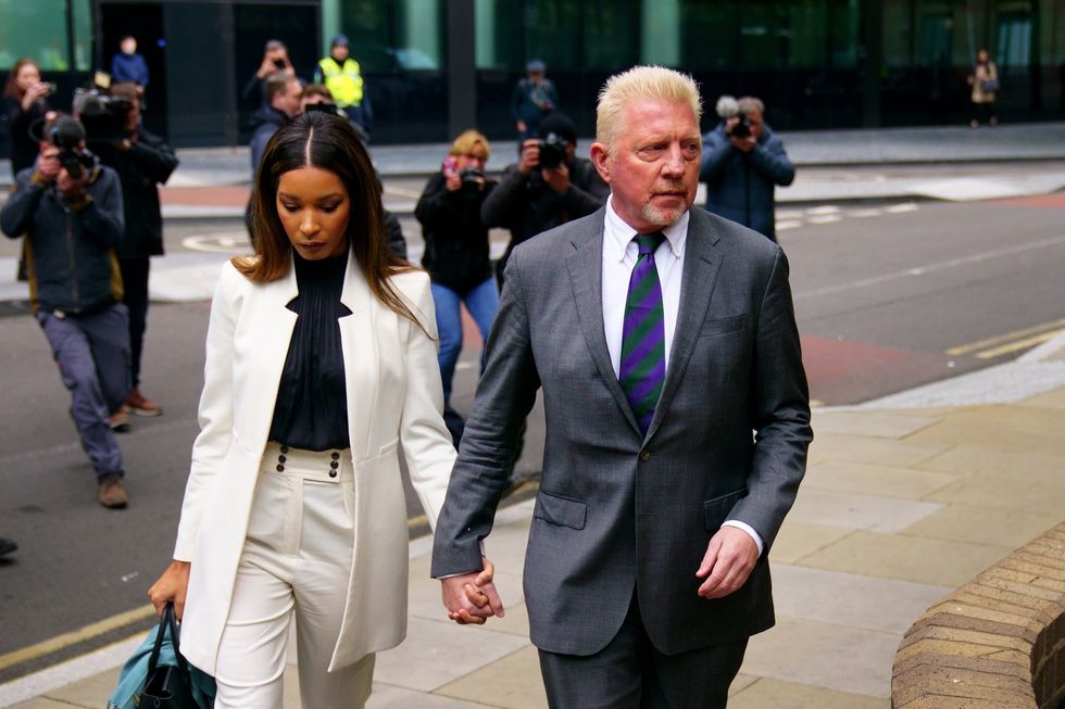 Boris arrives alongside partner Lilian de Carvalho Monteiro, for sentencing at Southwark Crown Court, in London