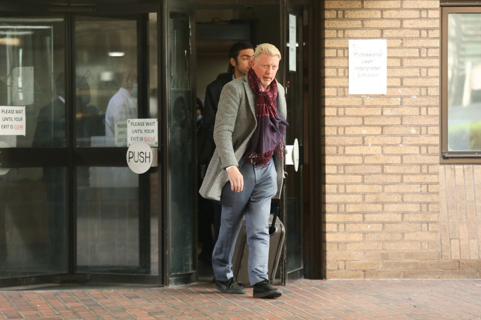 Boris Becker (front) with his son Noah leaving Southwark Crown Court
