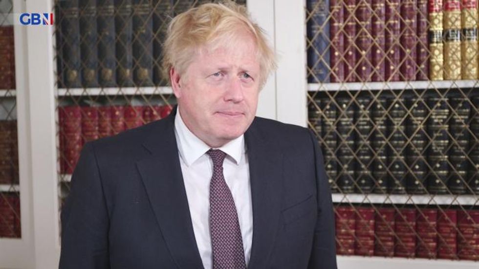 Boris Johnson urges public to 'go about your business in a normal way' amid panic-buying induced fuel shortages