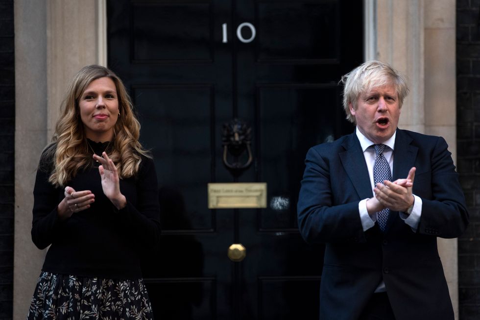 Boris Johnson and wife Carriestand in Downing Street, London