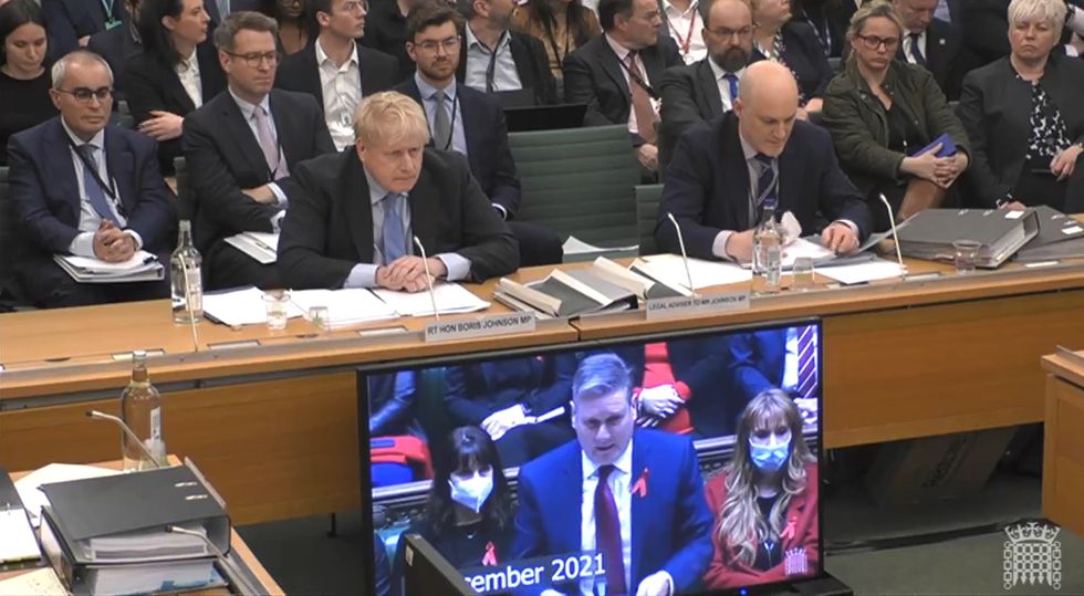 Boris Johnson in a crowded Commons committee room