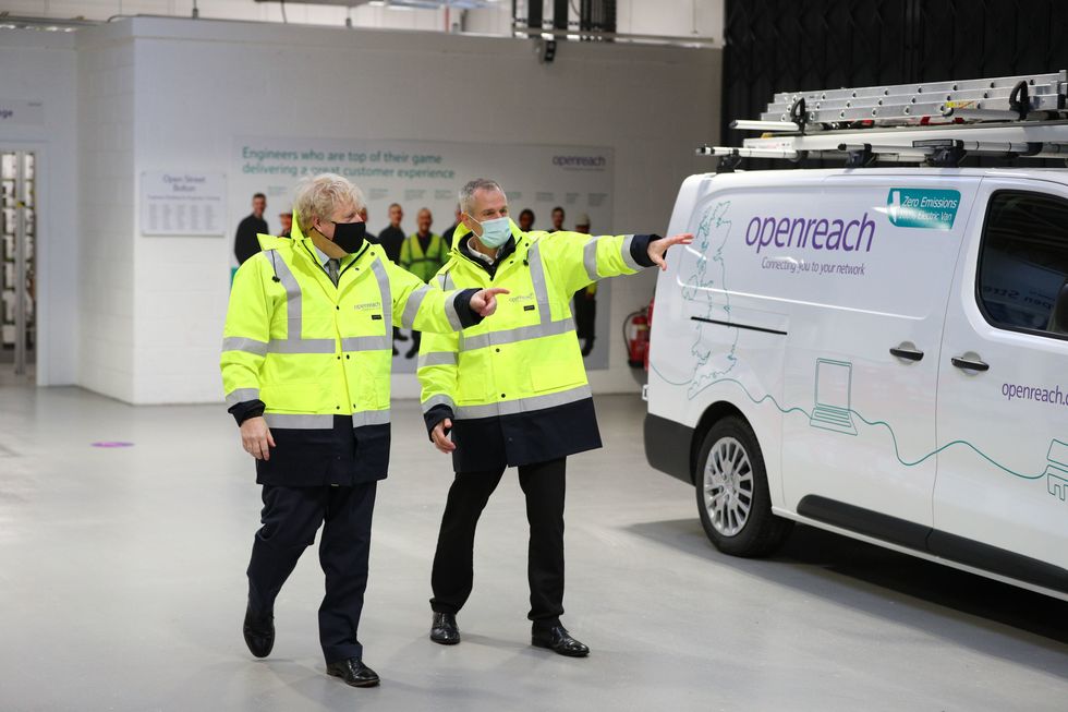 Boris Johnson is pictured on a tour of an Openreach facility during the pandemic