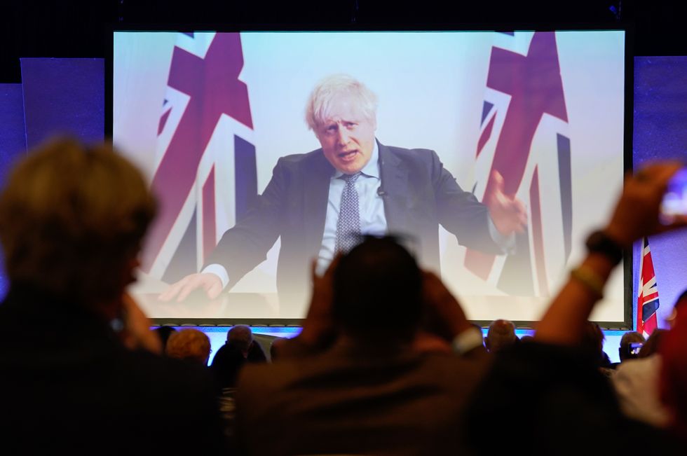 Boris Johnson on a screen at CDO conference