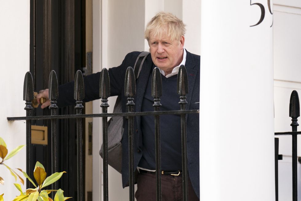 Boris Johnson outside his home in London