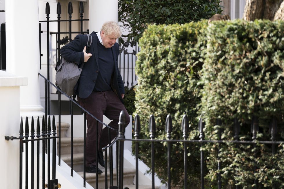 Boris Johnson outside his home in London