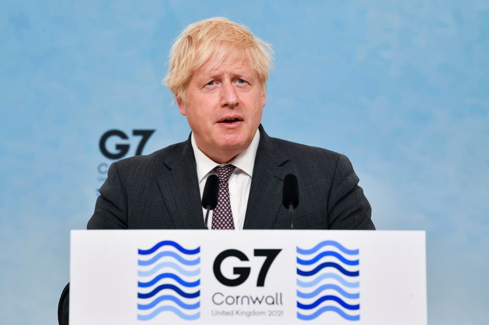 Boris Johnson speaks during a news conference at the end of the G7 summit