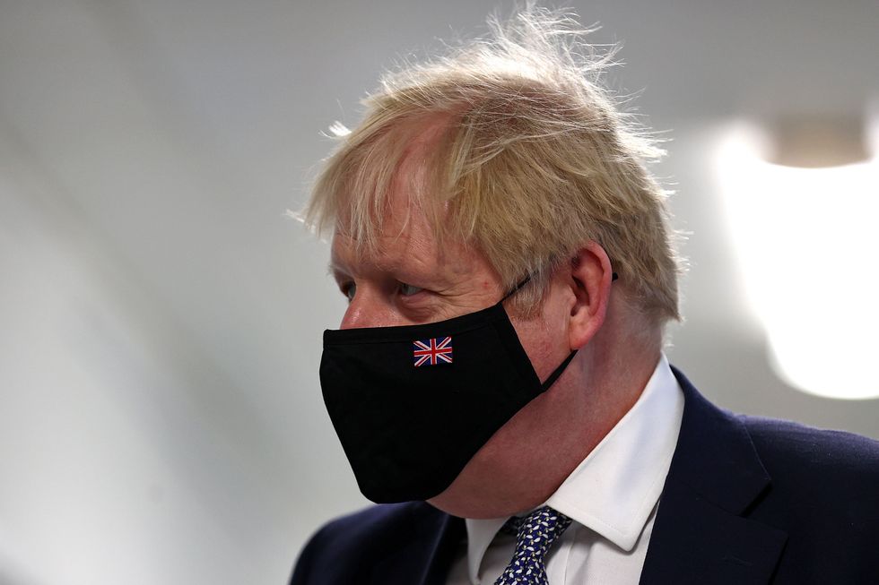 Boris Johnson was regularly seen wearing a mask during the pandemic