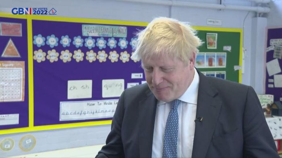 Boris Johnson insists Tories 'absolutely determined' to rebuild economy after disappointing local election results