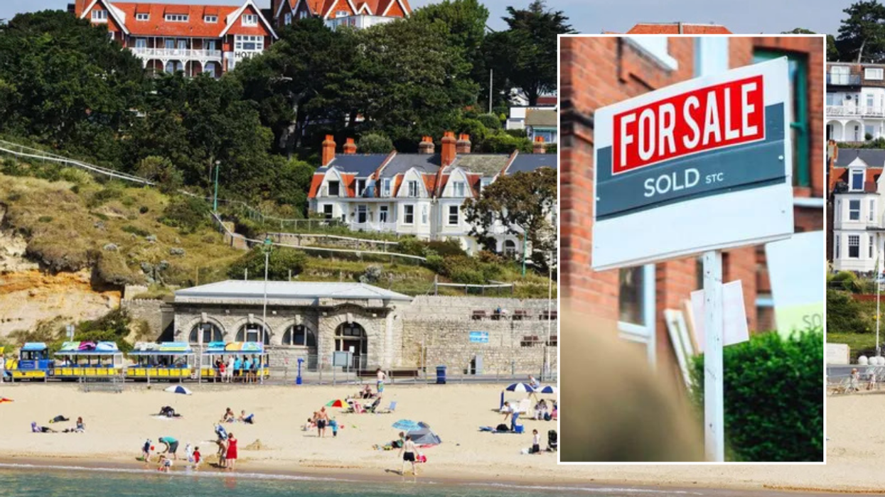 Bournemouth beach / for sale sign