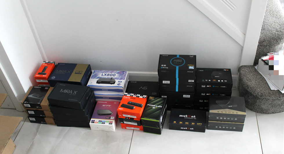 boxes of streaming devices including fire tv stick pictured on the floor