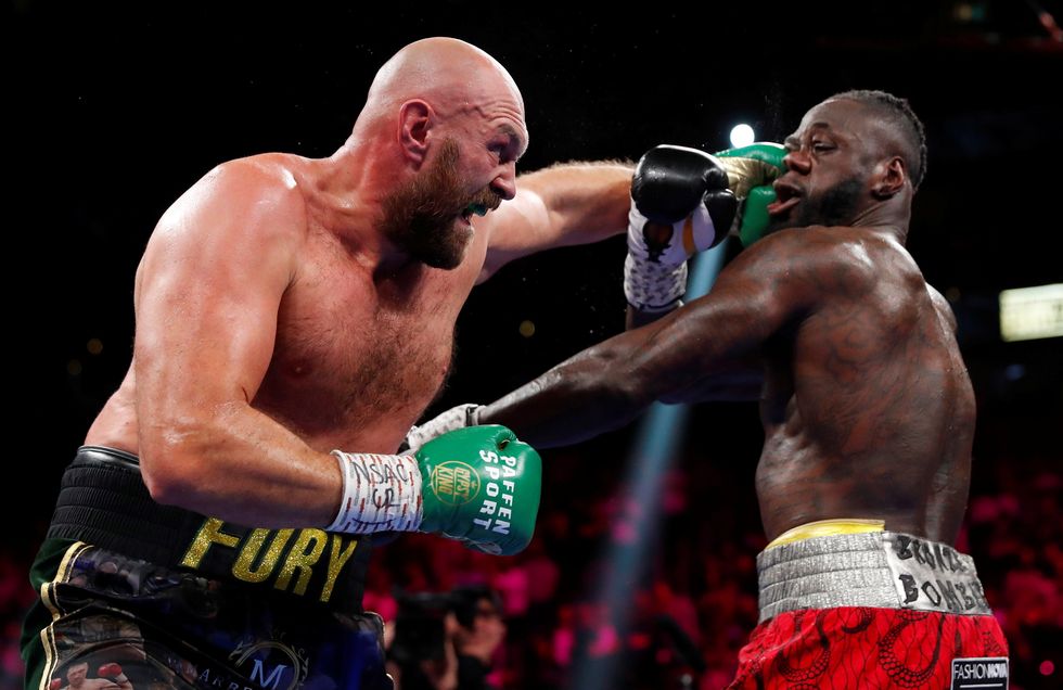 Boxing - Tyson Fury v Deontay Wilder - WBC Heavyweight Title - T-Mobile Arena, Las Vegas, Nevada, U.S. - October 9, 2021  Tyson Fury in action against Deontay Wilder REUTERS/Steve Marcus     TPX IMAGES OF THE DAY