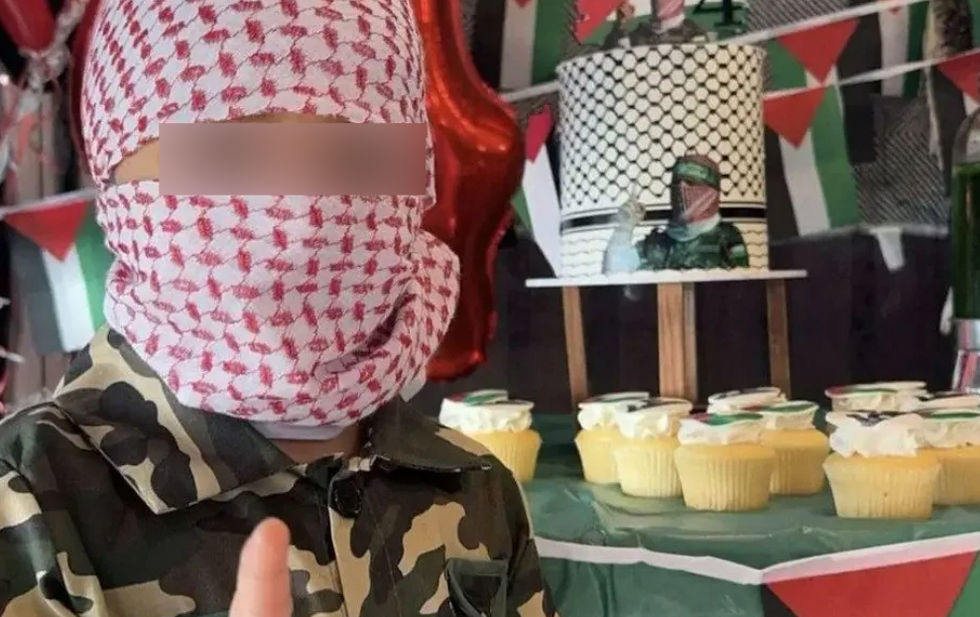 Boy posing with the cakes