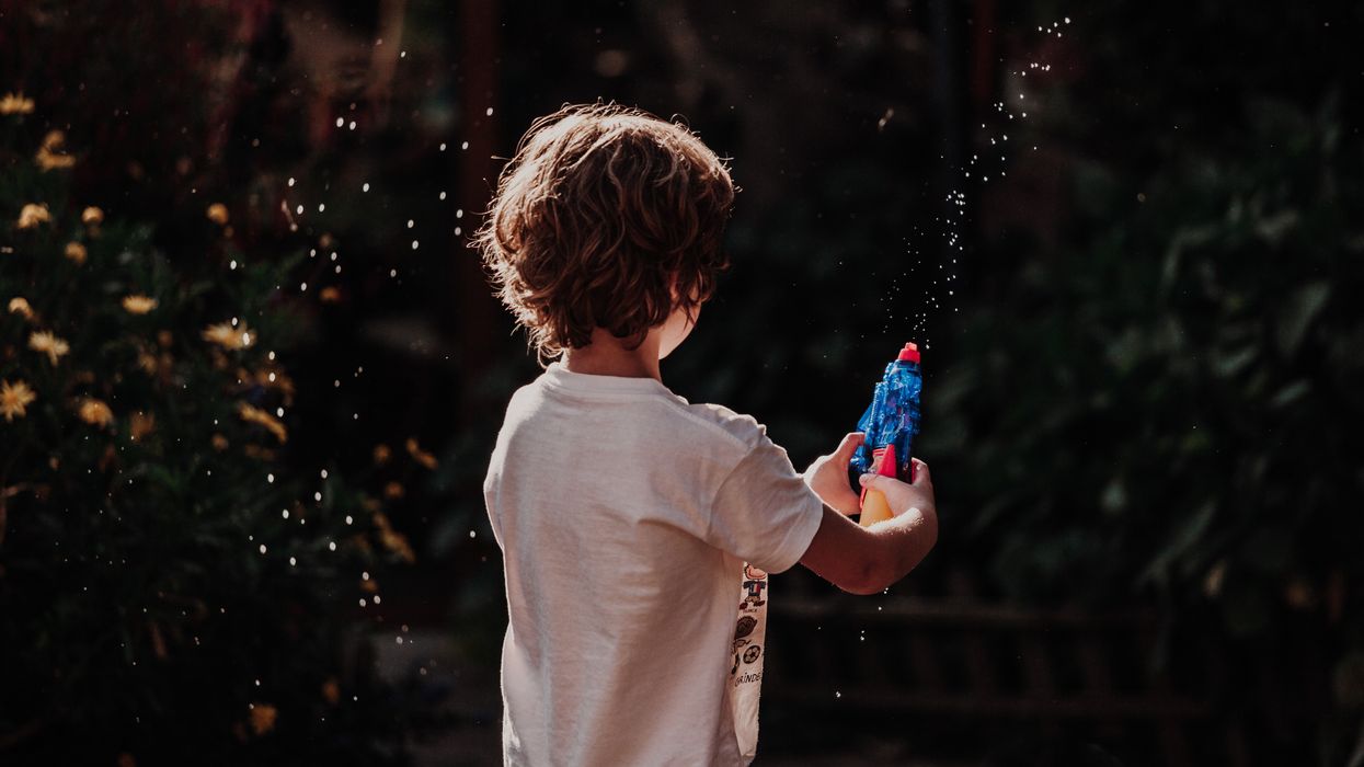 boy with water pistol