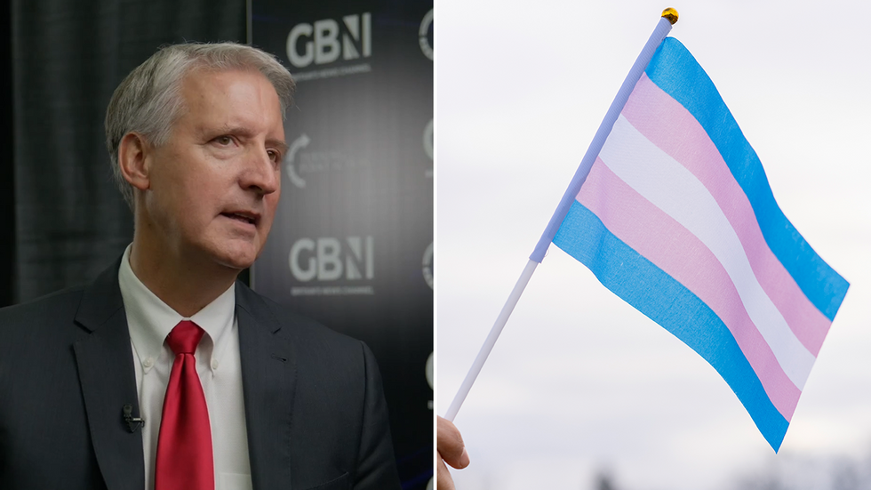 Brad Dacus and an LGBT flag