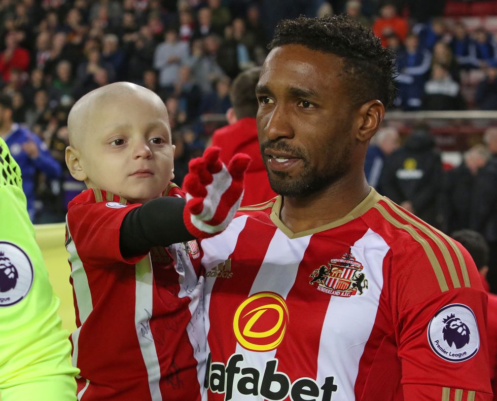 Bradley Lowery with Jermain Defoe of Sunderland prior to the Premier League match between Sunderland and Chelsea at Stadium of Light on December 14, 2016