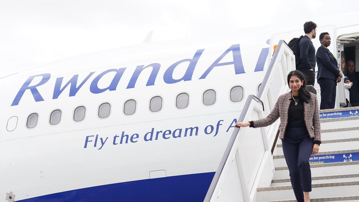 Braverman exiting a Rwanda Air flight