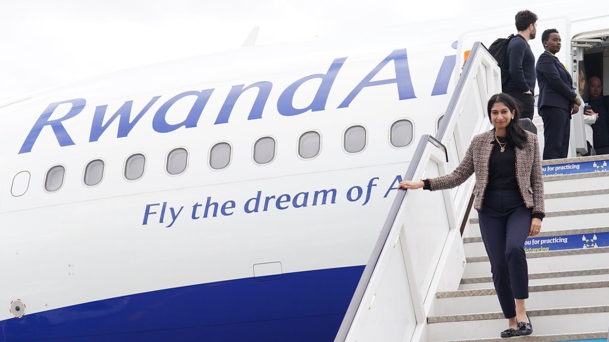 Braverman exiting a Rwanda Air flight