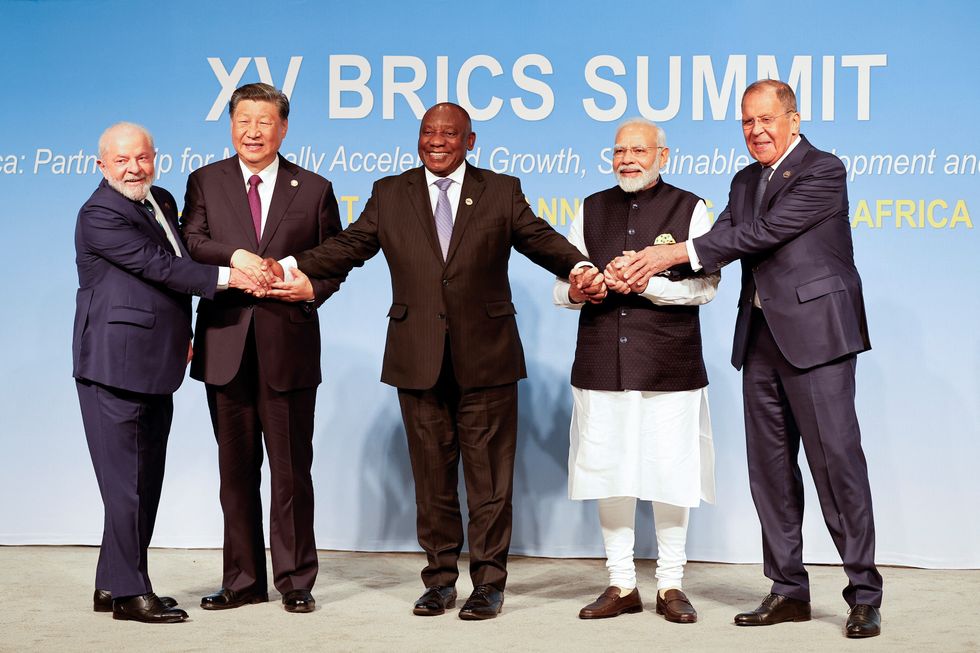 Brazil's President Luiz Inacio Lula da Silva, China's President Xi Jinping, South Africa's President Cyril Ramaphosa, India's Prime Minister Narendra Modi and Russia's Foreign Minister Sergei Lavrov pose during BRICS summit in Johannesburg, South Africa