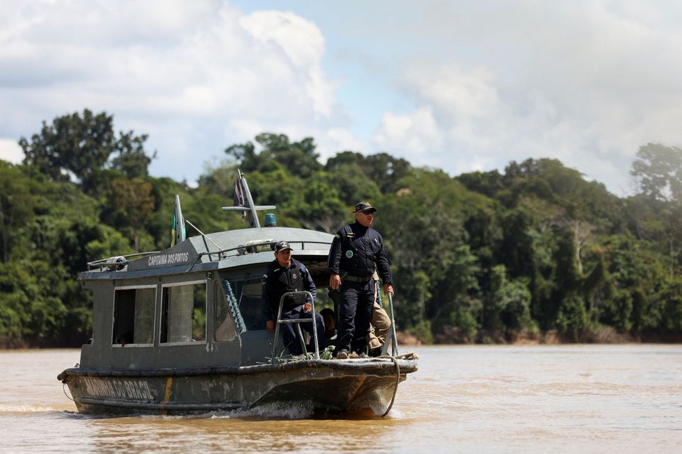 Brazilian Navy members conduct a search operation for British journalist Dom Phillips and indigenous expert Bruno Pereira, who went missing while reporting in a remote and lawless part of the Amazon rainforest, near the border with Peru, in Atalaia do Norte, Amazonas state, Brazil