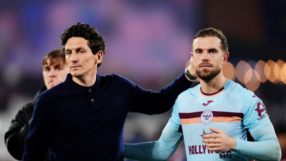 Brentford manager Keith Andrews (left) and Jordan Henderson after the Emirates FA Cup fifth round match