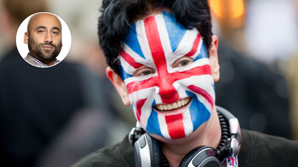 Brexit fan with Union Jack face paint celebrates during the day at the lunch time Brexit gathering in Parliament Square