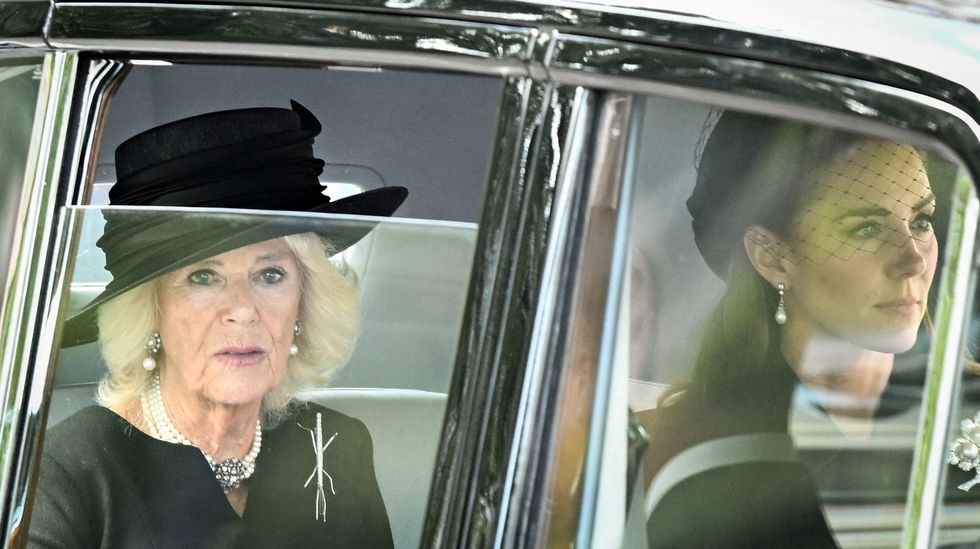 Britain's Camilla, Queen Consort and Britain's Catherine, Princess of Wales arrive for a service for the reception of Queen Elizabeth II's coffin at Westminster Hall, in the Palace of Westminster in London on September 14, 2022, where the coffin of Queen Elizabeth II, will Lie in State.     CARL DE SOUZA/Pool via REUTERS     TPX IMAGES OF THE DAY