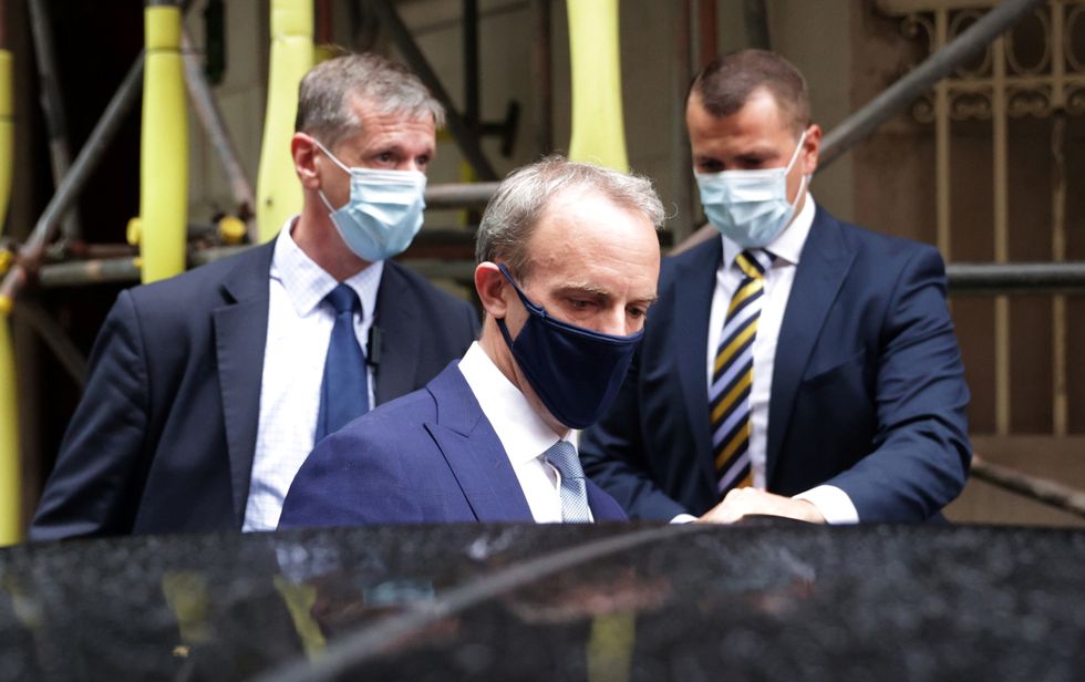 Britain's Foreign Secretary Dominic Raab leaves television studios in central London, Britain, August 17, 2021. REUTERS/Hannah McKay