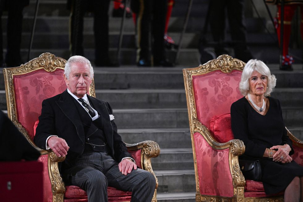 Britain's King Charles and Queen Camilla sit during the presentation of addresses by both Houses of Parliament to his Majesty King Charles III, in Westminster Hall, inside the Palace of Westminster, in London, Britain September 12, 2022.  UK Parliament/Jessica Taylor/Handout via REUTERS   ATTENTION EDITORS- THIS IMAGE HAS BEEN SUPPLIED BY A THIRD PARTY. MANDATORY CREDIT. IMAGE MUST NOT BE ALTERED