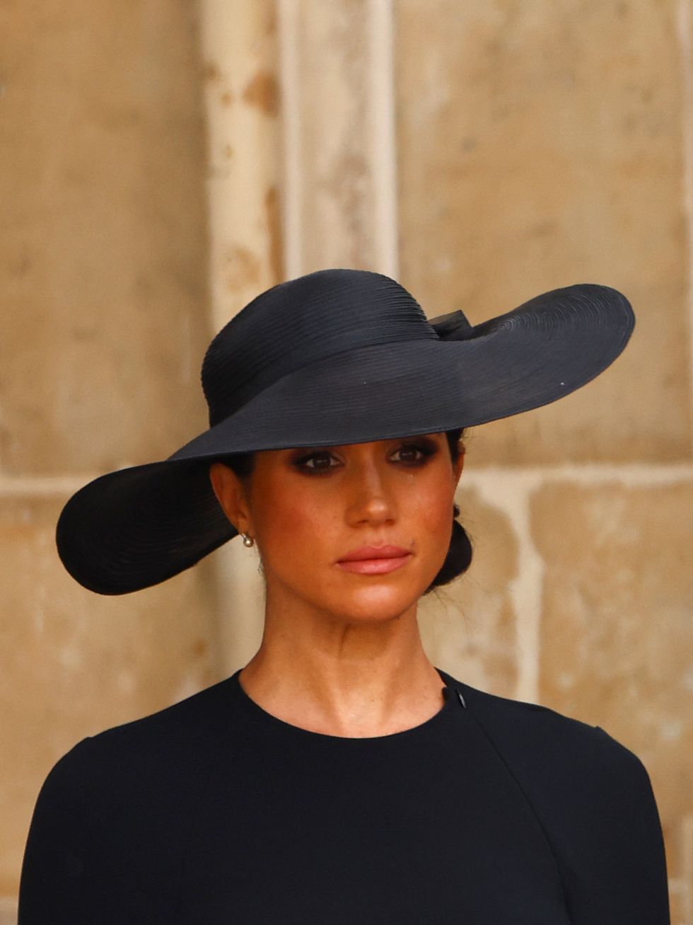 Britain's Meghan, Duchess of Sussex gets emotional as she attends the state funeral and burial of Britain's Queen Elizabeth at Westminster Abbey, in London, Britain, September 19, 2022.  REUTERS/Kai Pfaffenbach