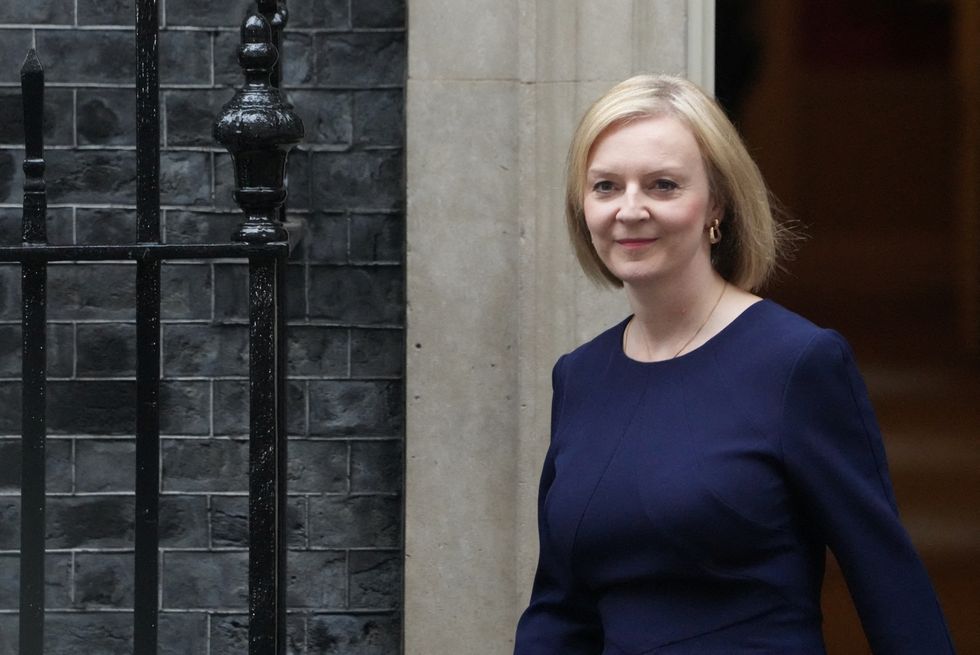 Britain's Prime Minister Liz Truss walks outside Downing Street in London, Britain, September 23, 2022. REUTERS/Maja Smiejkowska