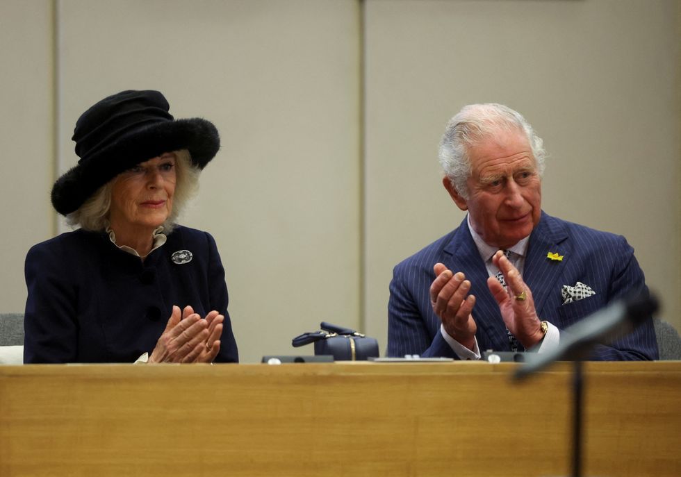 Britain's Prince Charles and Camilla, Duchess of Cornwall, attend a council meeting during their visit at the Civic Centre during a visit to Southend-on-Sea, Britain, March 1, 2022. REUTERS/Matthew Childs/Pool