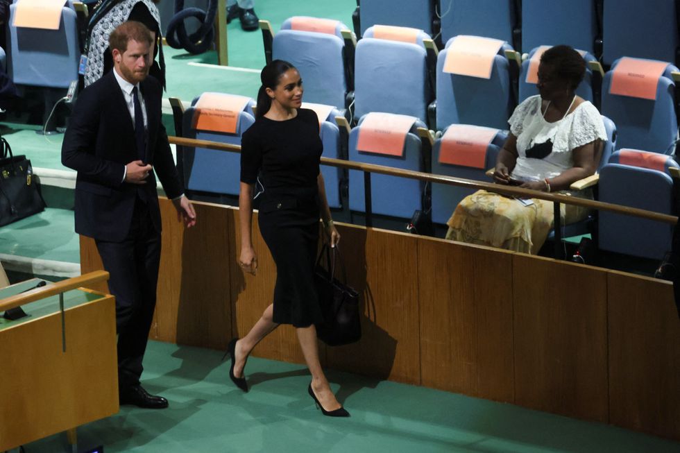 Britain's Prince Harry and his wife Meghan, Duchess of Sussex walk during a celebration of Nelson Mandela International Day at the United Nations Headquarters in New York, U.S., July 18, 2022. REUTERS/Shannon Stapleton