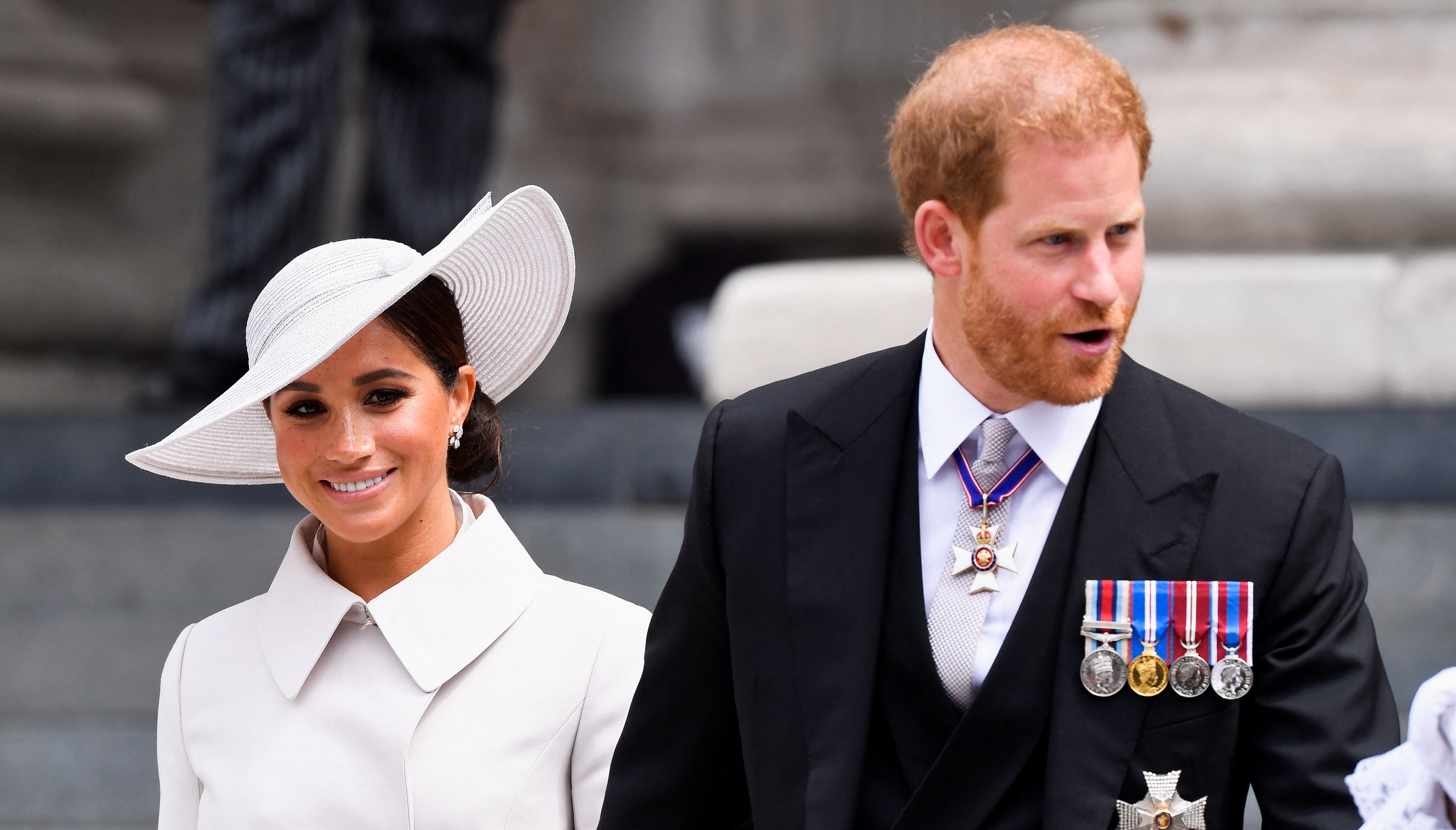 Britain's Prince Harry and Meghan, Duchess of Sussex, leave after attending the National Service of Thanksgiving at St Paul's Cathedral during the Queen's Platinum Jubilee celebrations in London, Britain, June 3, 2022. REUTERS/Toby Melville/Pool