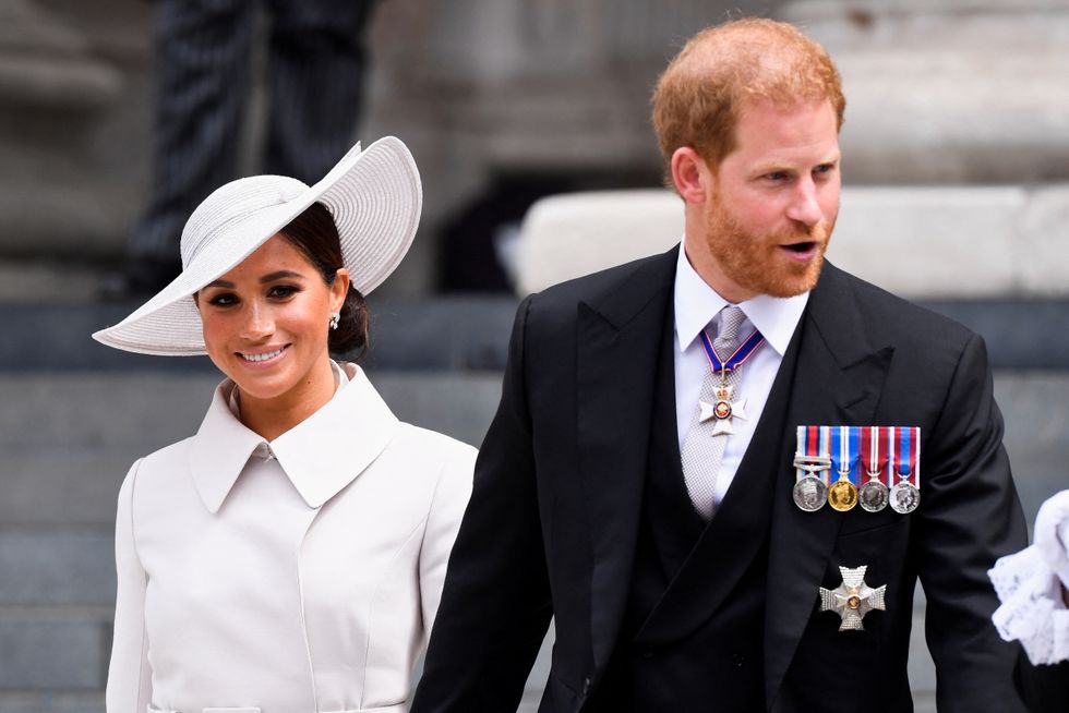 Britain's Prince Harry and Meghan, Duchess of Sussex, leave after attending the National Service of Thanksgiving at St Paul's Cathedral during the Queen's Platinum Jubilee celebrations in London, Britain, June 3, 2022. REUTERS/Toby Melville/Pool