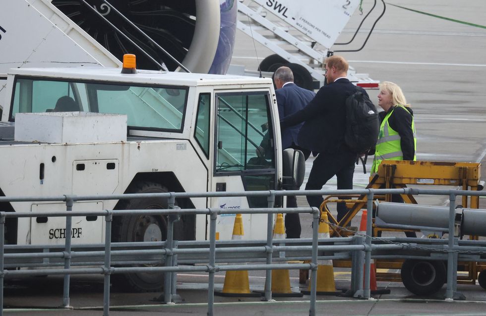 Britain's Prince Harry boards a plane at Aberdeen International Airport, following the passing of Britain's Queen Elizabeth, in Aberdeen, Britain, September 9, 2022. REUTERS/Phil Noble