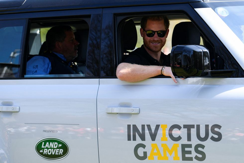 Britain's Prince Harry rides a vehicle as he attends the Land Rover Driving Challenge of the Invictus Games in The Hague, Netherlands April 16, 2022. REUTERS/Piroschka Van De Wouw