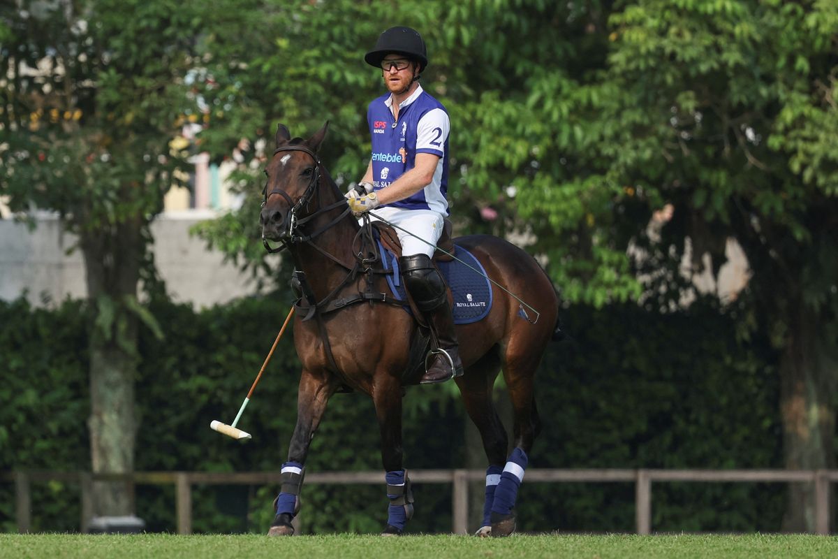Prince Harry on horseback for Sentebale Handa Polo Cup in Singapore