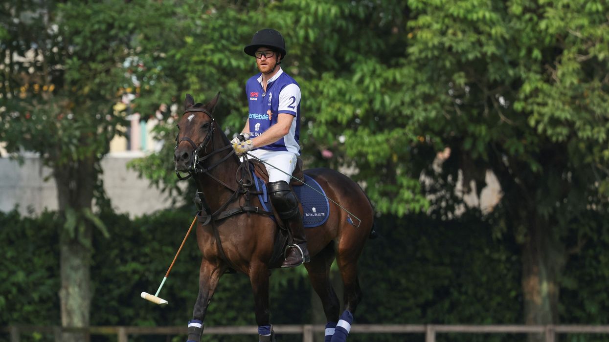 Prince Harry on horseback for Sentebale Handa Polo Cup in Singapore