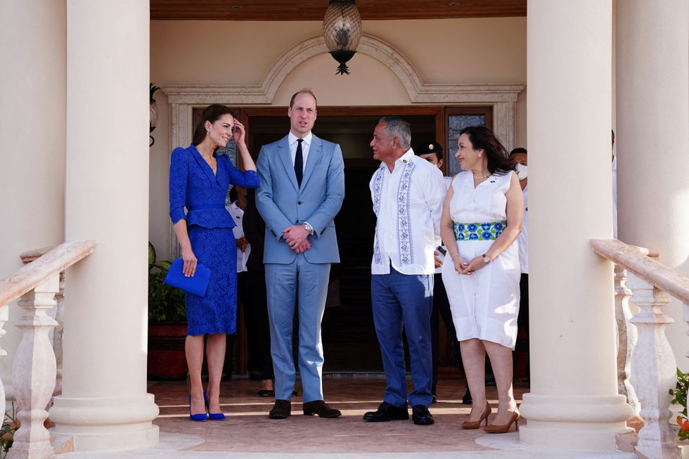 Britain's Prince William and Catherine, Duchess of Cambridge, meet with Belize's Prime Minister Johnny Briceno and his wife Rossana, as they begin their tour of the Caribbean on behalf of the Queen to mark her Platinum Jubilee, at the Laing Building, in Belize City, Belize March 19, 2022. Jane Barlow/Pool via REUTERS