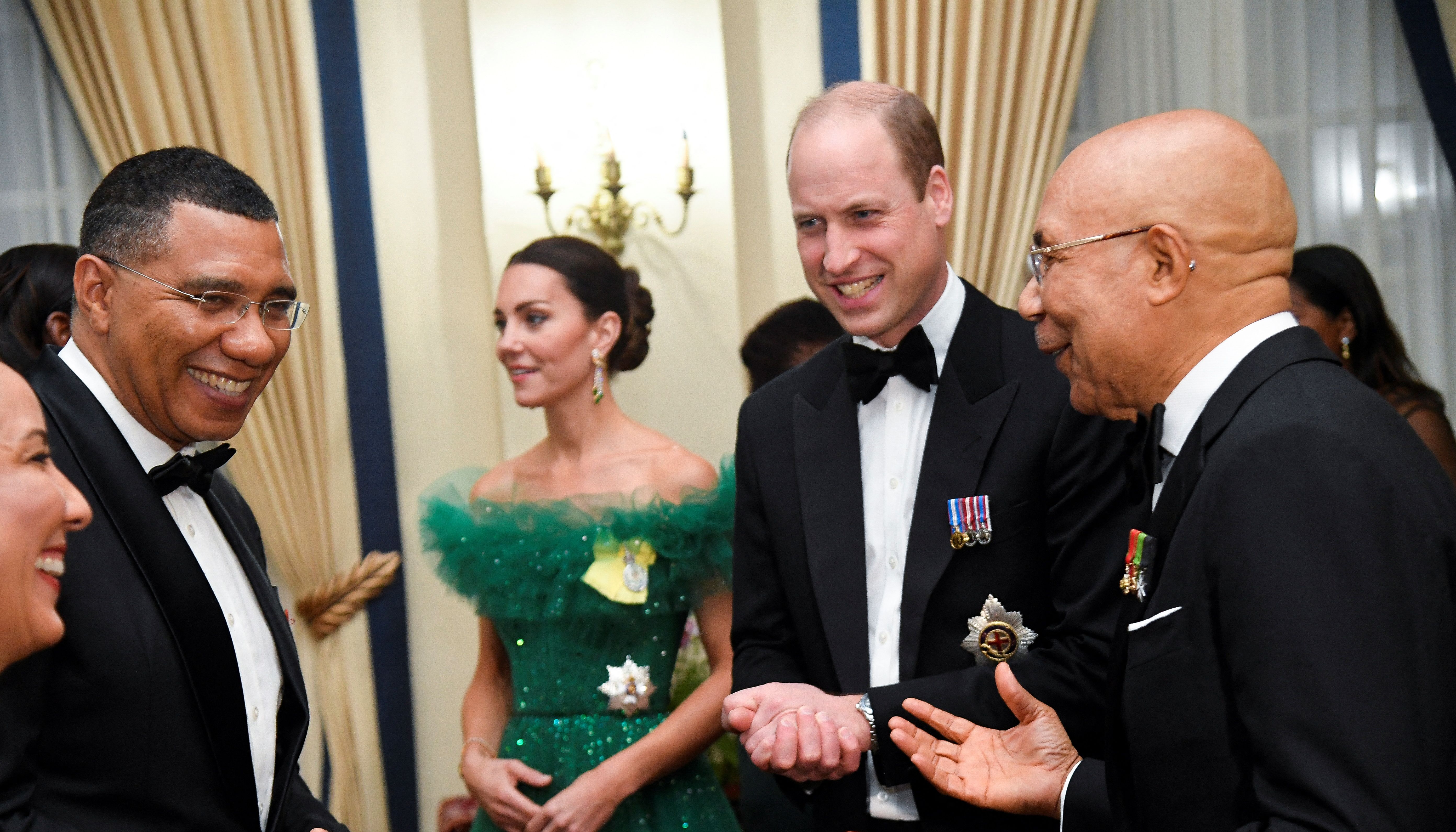 Britain's Prince William speaks with Jamaica's Prime Minister Andrew Holness and the Governor General of Jamaica Patrick Allen during a dinner hosted by the Governor General of Jamaica Patrick Allen and his wife Patricia on the fifth day of his tour of the Caribbean, Kingston, Jamaica.