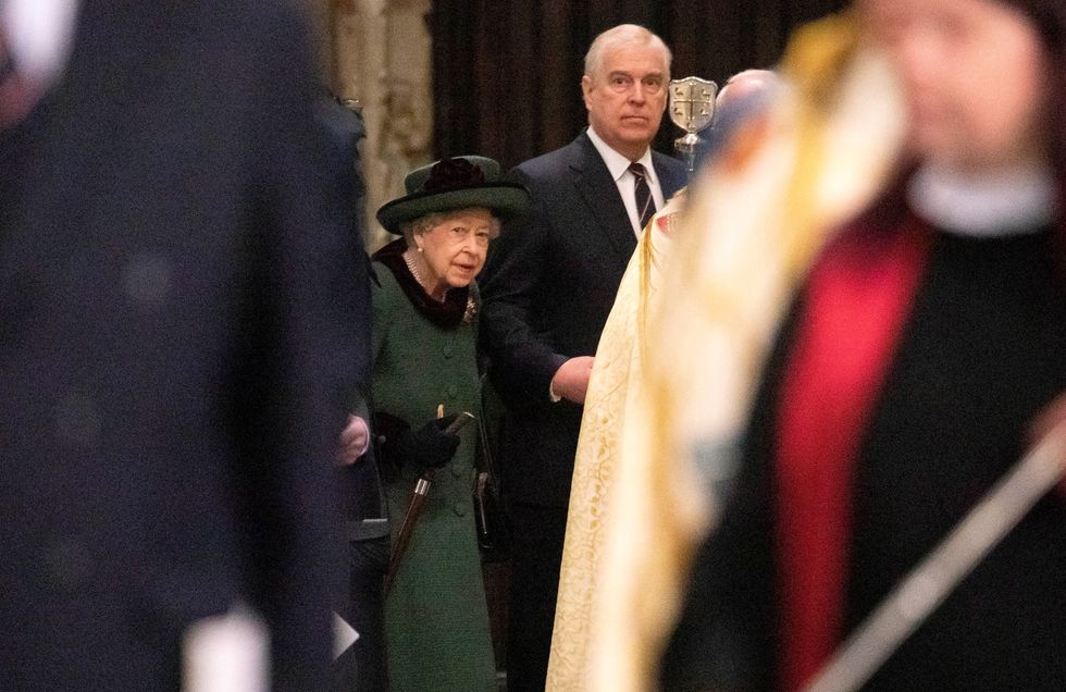 Britain's Queen Elizabeth, accompanied by Prince Andrew, Duke of York, attends a service of thanksgiving for late Prince Philip, Duke of Edinburgh, at Westminster Abbey in London.