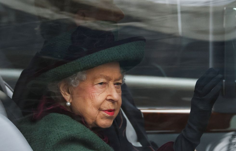 Britain's Queen Elizabeth and Prince Andrew, Duke of York, arrive for the service of thanksgiving for late Prince Philip, Duke of Edinburgh, at Westminster Abbey, in London, Britain, March 29, 2022. REUTERS/Tom Nicholson